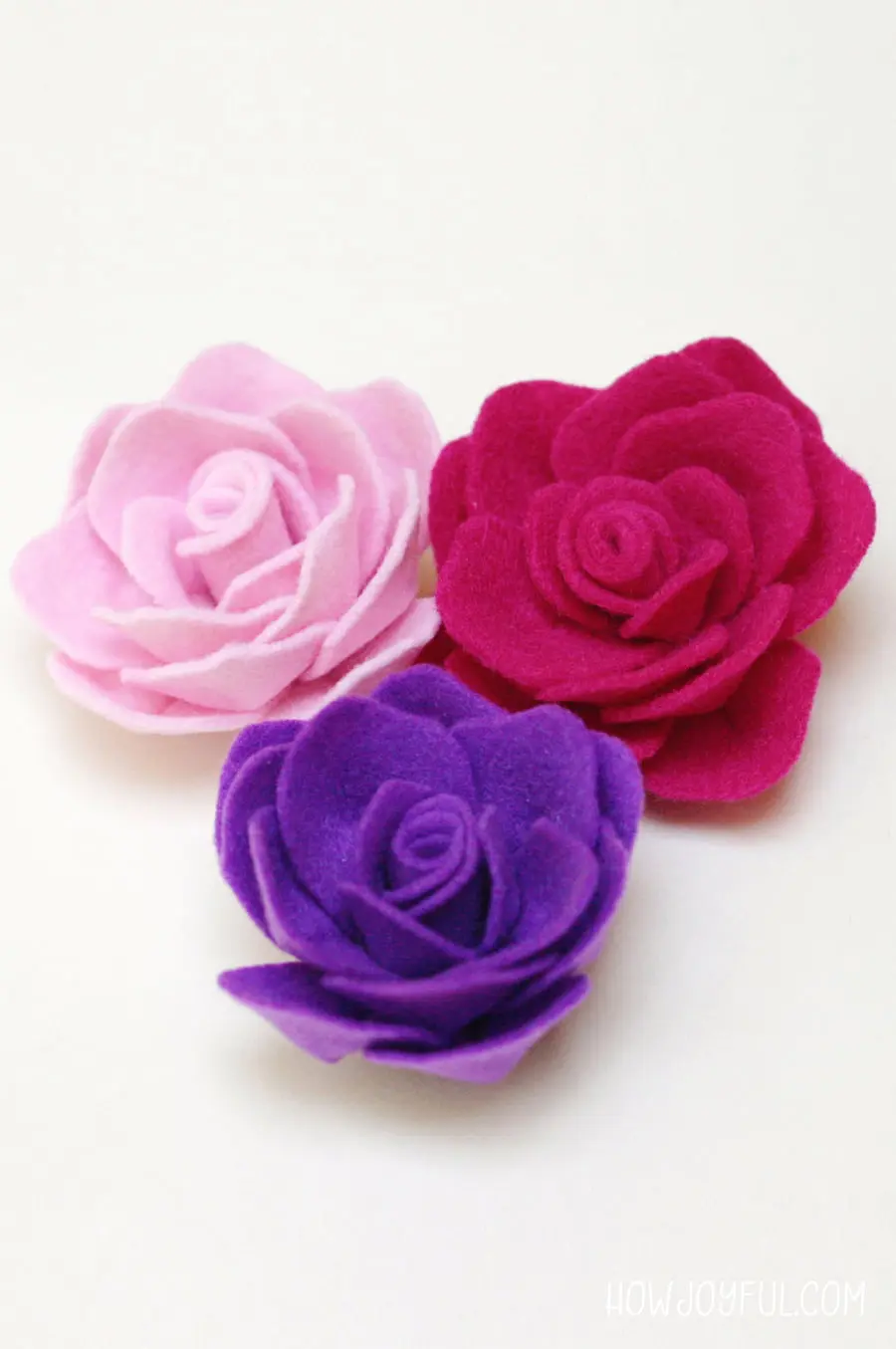 Learn how to make a rose out of felt with @howjoyful's FREE pattern