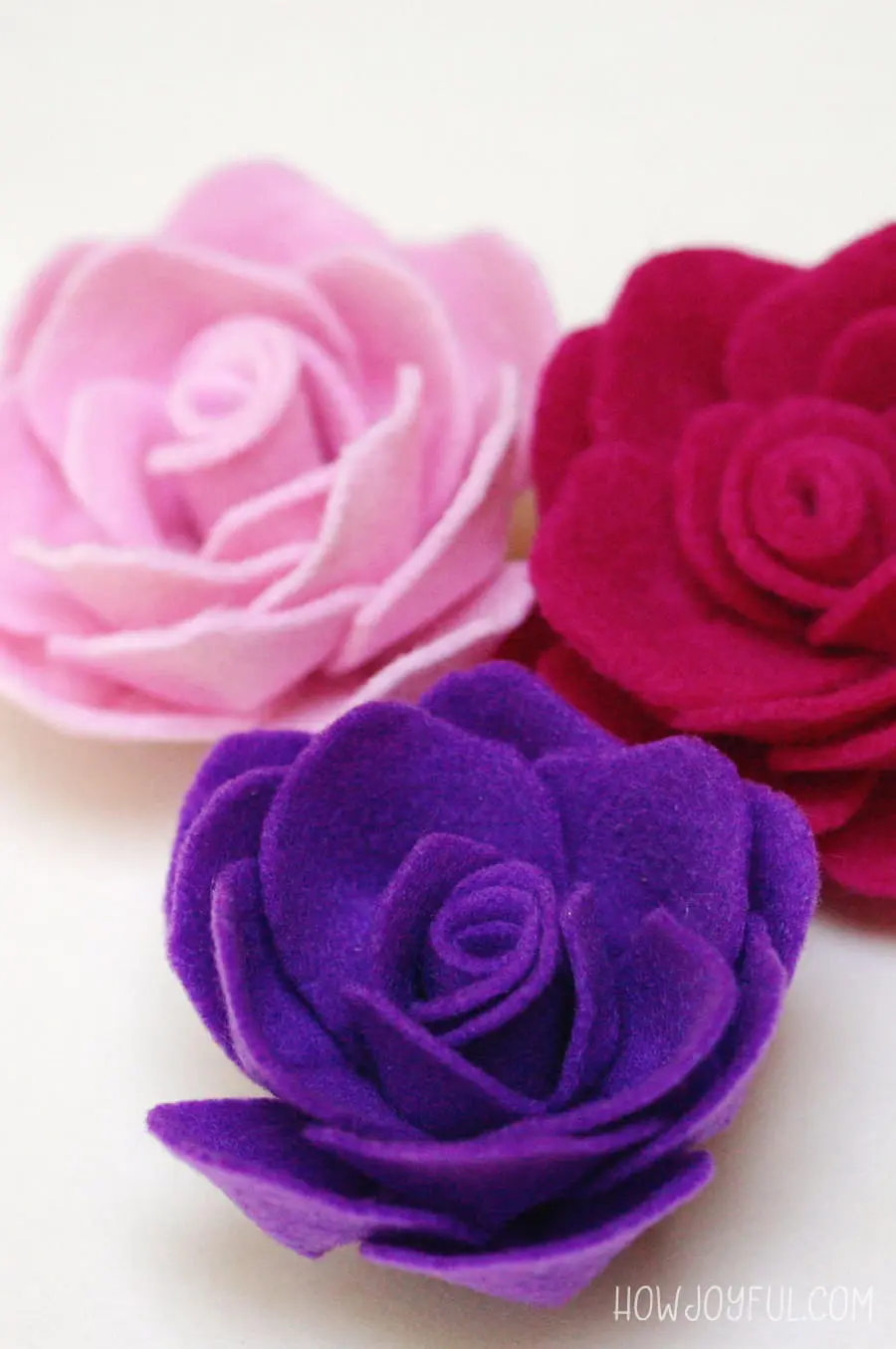 Learn how to make a rose out of felt with @howjoyful's FREE pattern